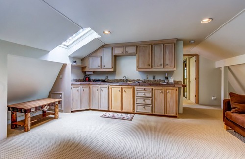 Trout Lake House | Gorgeous Riverfront Home & Guesthouse with Deck, Firepits & Media Room