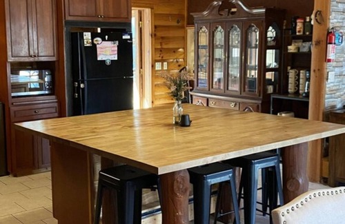 Arenac County Cabin | Gorgeous, Secluded Large Log 4 Bedroom Cabin with a pond view on several acres!
