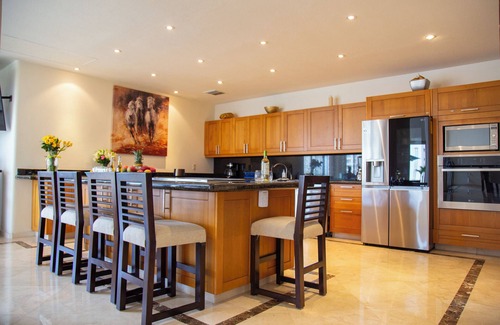 Flamingos Villa | Gorgeous Two-Story Penthouse Private Community on the Beach!