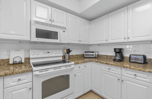 New Smyrna Beach Condo | Gorgeous Unit - TV in Every Room- Resort Style Complex- Short Walk To the Beach