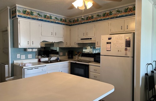 North Myrtle Beach Condo | Gorgeous water front view with 2 minute walk to the beach.