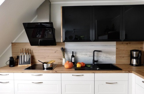 Greetsiel Apartment | Grachtensteern- Maisonette Og-ferienwohnung Direkt an der Greetsieler Gracht