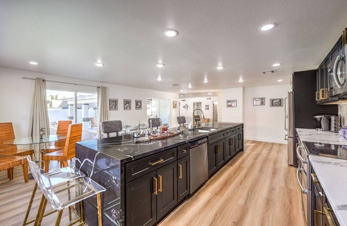 Paradise House | Grand 5BR/4BA Pool Home: Sleeps 14 & Perfect for Families near Strip!