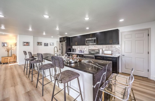 Paradise House | Grand 5BR/4BA Pool Home: Sleeps 14 & Perfect for Families near Strip!