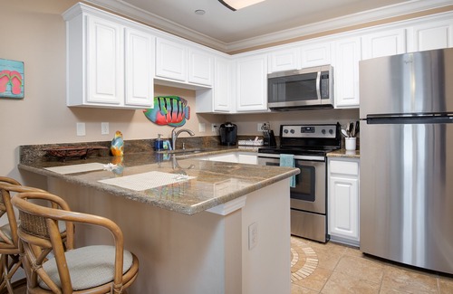 Ono Island Condo | GRAND CARIBBEAN #310: A PERDIDO KEY PARADISE STEPS AWAY FROM THE BEACH!