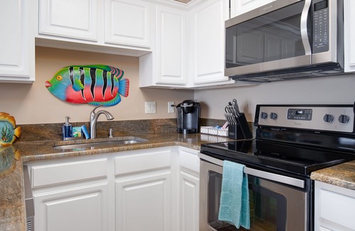 Ono Island Condo | GRAND CARIBBEAN #310: A PERDIDO KEY PARADISE STEPS AWAY FROM THE BEACH!