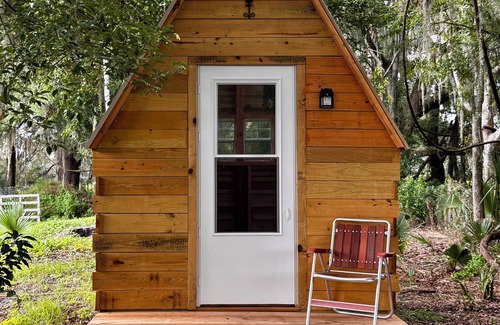 Reddick Cabin | Grass Campers whimsical 1 room Glamping Forest Hideaway Sugar Shanty near WEC