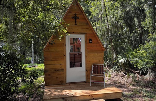 Reddick Cabin | Grass Campers whimsical 1 room Glamping Forest Hideaway Sugar Shanty near WEC