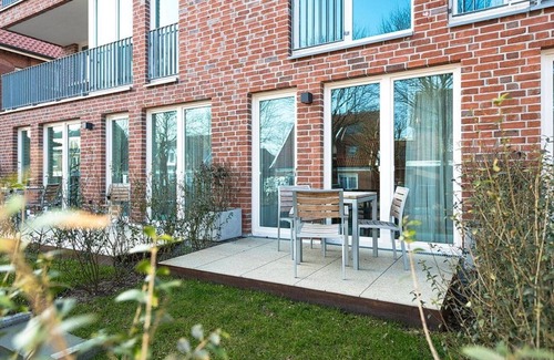 Langeoog Apartment | Great apartment close to the beach with sunny south-facing terrace and sauna area in the house