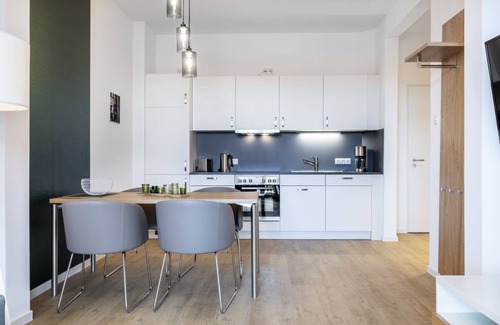 Wismar Apartment | Great apartment in harbor location with balcony and view of the maritime harbor life -