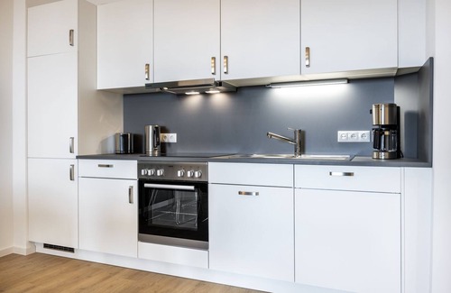 Wismar Apartment | Great apartment in harbor location with balcony and view of the maritime harbor life -