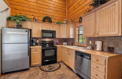 Branson Theater District Cabin | Great Family Cedar Cabin with Fireplace & Screened Deck just Minutes from Shows!