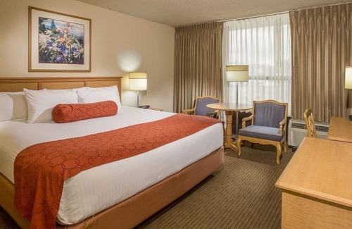 Wilburton Hotel | Great Location & Amenities! Private Parking, Outdoor Pool, Pets Allowed!