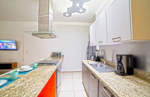 Diaz Ordaz Condo | Great location + rooftop pool