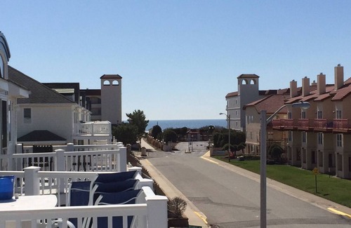 Diamond Beach Condo | Great location, ocean + bay view, heated pool, garage, bikes, recently renovated