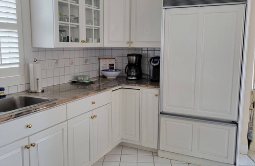 South End Condo | Great Summer Getaway! Steps to Beach, Ocean views and large wraparound deck
