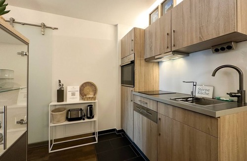 Wremen Apartment | Great vacation apartment with sauna, south-facing balcony, beach chair and beautiful