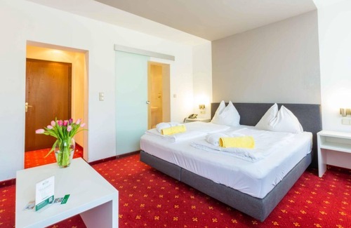 Seeboden House | Großes Doppelzimmer Waldseite - Hotel Bellevue