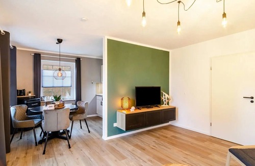 Neßmersiel Apartment | Ground floor apartment with terrace for 3 pers. max. 4 pers. Pets allowed Wallbox