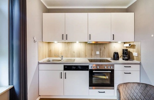 Neßmersiel Apartment | Ground floor apartment with terrace for 3 pers. max. 4 pers. Pets allowed Wallbox
