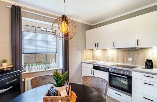 Neßmersiel Apartment | Ground floor apartment with terrace for 3 pers. max. 4 pers. Pets allowed Wallbox