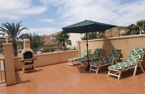 Los Nietos Apartment | Ground floor apartment, free wifi, satellite tv, BBQ, communal pool