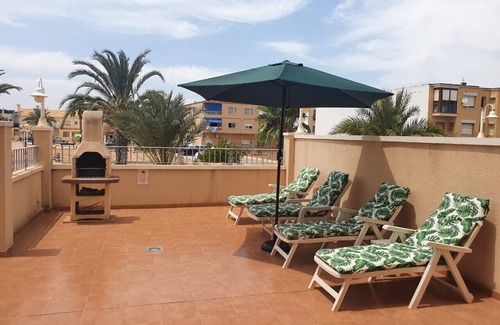 Los Nietos Apartment | Ground floor apartment, free wifi, satellite tv, BBQ, communal pool