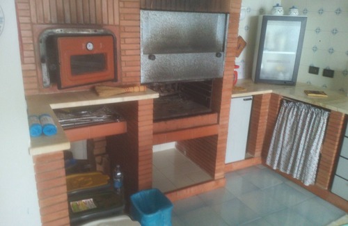 Agropoli Apartment | Ground floor apartment in a villa with garden and parking.