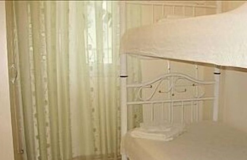 Fethiye City Center Apartment | Ground Floor Apartment With Shared Pool And Gardens