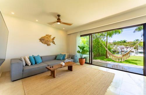 Puerto Aventuras Apartment | Ground Floor Paradise with Marina View and Pool Paddleboard Included