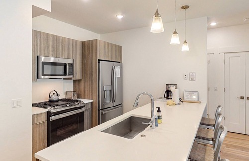 Silverthorne Condo | Ground-Floor, Riverfront Getaway with a Gas Fireplace, WiFi, & Furnished Patio