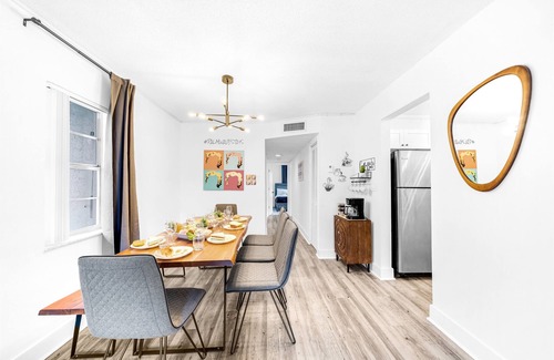 Survey Creek Apartment | Ground Floor - Water View - Palm Wave Says