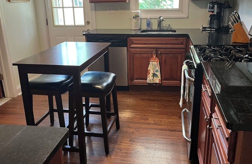 Highlands Cottage | Ground floor water side 1-bedroom cottage. Rocking chair front porch. No stairs