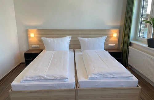 Pasewalk Bed & Breakfast | Guest house double room 104 - Lokschuppen Pasewalk- Guest houses with double rooms, single rooms and