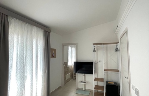 Lotzorai House | Guest House 'Grazia Deledda' with Shared Terrace, Wi-Fi and Air Conditioning