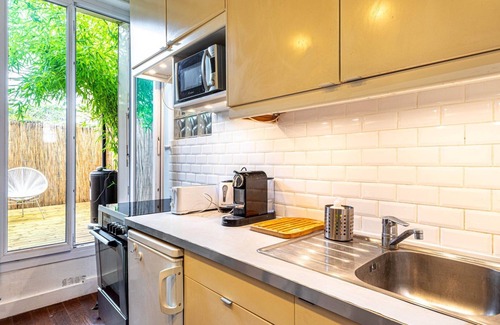 Combat Apartment | GuestReady - Parisian retreat with a courtyard