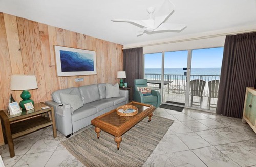 Fort Walton Beach Apartment | Gulf Dunes 314 Sunny & Chair