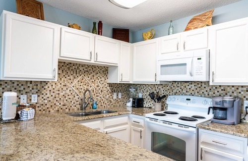 Crystal Beach Condo | Gulf view, direct beach access, heated pool, hot tub