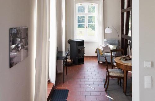 Lensahn Apartment | Gut Petersdorf Lensahn - ideal für Familien und Hunde - mit Kamin, Parkblick, Terrasse und eingezäuntem Garten