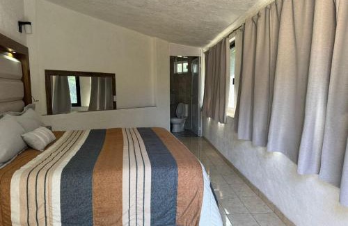 Valle de Bravo Cabin | Habitaciones las cascadas