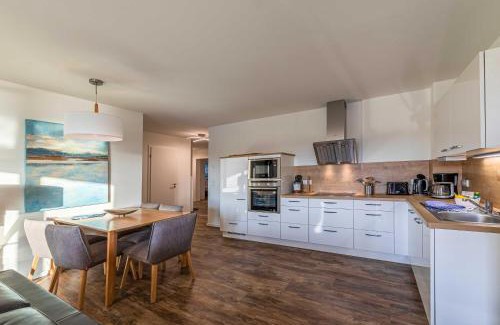 Muritz Apartment | Hafenflair- Apartment mit Balkon & Kamin in der Hafenresidenz