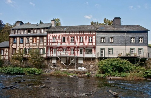 Monschau House | Half-timbered house 18th century, modern design, terrace, river property
