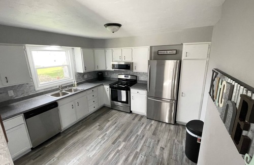 Oshkosh House | Hang out at The Hangar! Newly remodeled, beautiful home, fully furnished.