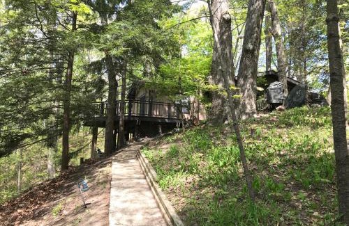 Covert House | Happy Days - located in the desirable rustic gated resort community - Pet Friendly!