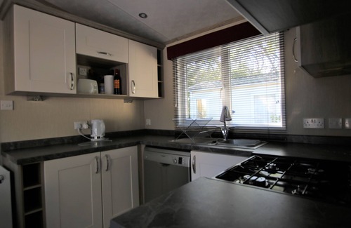 Mudeford House | Harbourside - a sandhills caravan that sleeps 4 guests in 2 bedrooms