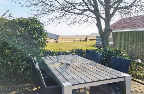 Diernæs Strandby House | Harmoniously renovated vacation home near the beach with a view of the water