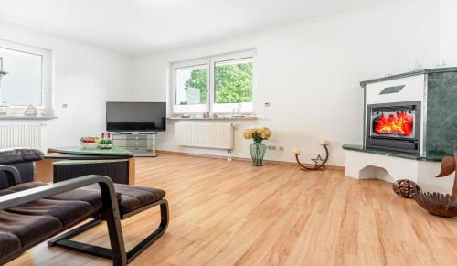 Koserow Apartment | Haus 5 Elemente- Fewo Erde mit Terrasse und Bio-Kamin