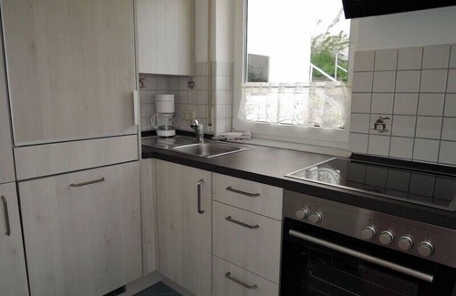 Bad Urach Apartment | Haus Eisele Ferienwohnung 1, 45qm, mit Doppelbett, Schlafsofa, TV, Badezimmer, Einbauküche, Sonnenterrasse
