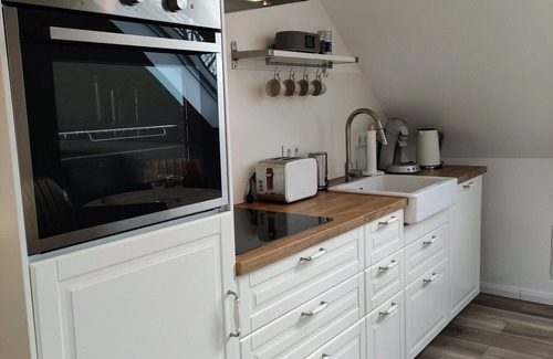 Tossens Condo | Haus im Seewind IV, 70 sqm - country house with large garden, near Friesenstrand