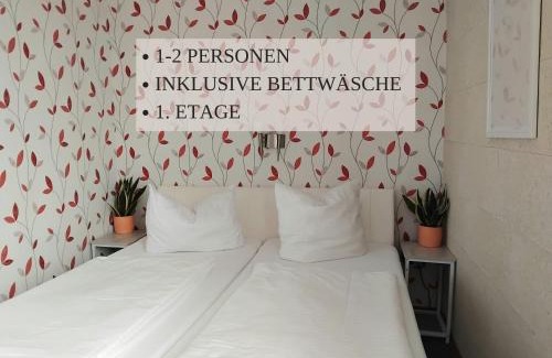 Wremen Apartment | Haus Krabbe Apartments, zentral gelegen zwischen Bremerhaven und Cuxhaven, Hunde kostenfrei willkommen, hauseigene kostenfreie Parkplätze, Unterstellmöglichkeit für Fahrräder und E-Bikes